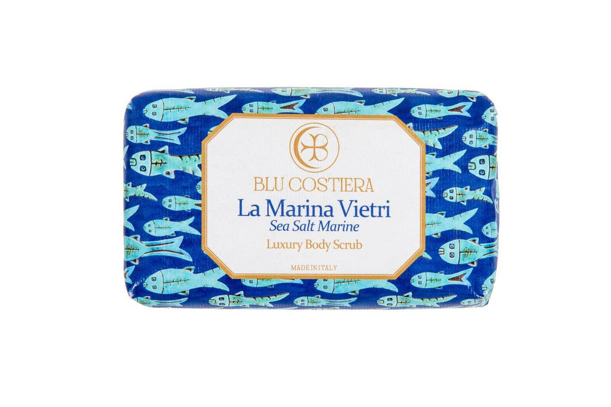 Blu Costiera La Marina Vietri body scrub bar wrapped in blue paper covered with turquoise Vietri fish, labelled Sea Salt Marine Luxury Body Scrub Made in Italy
