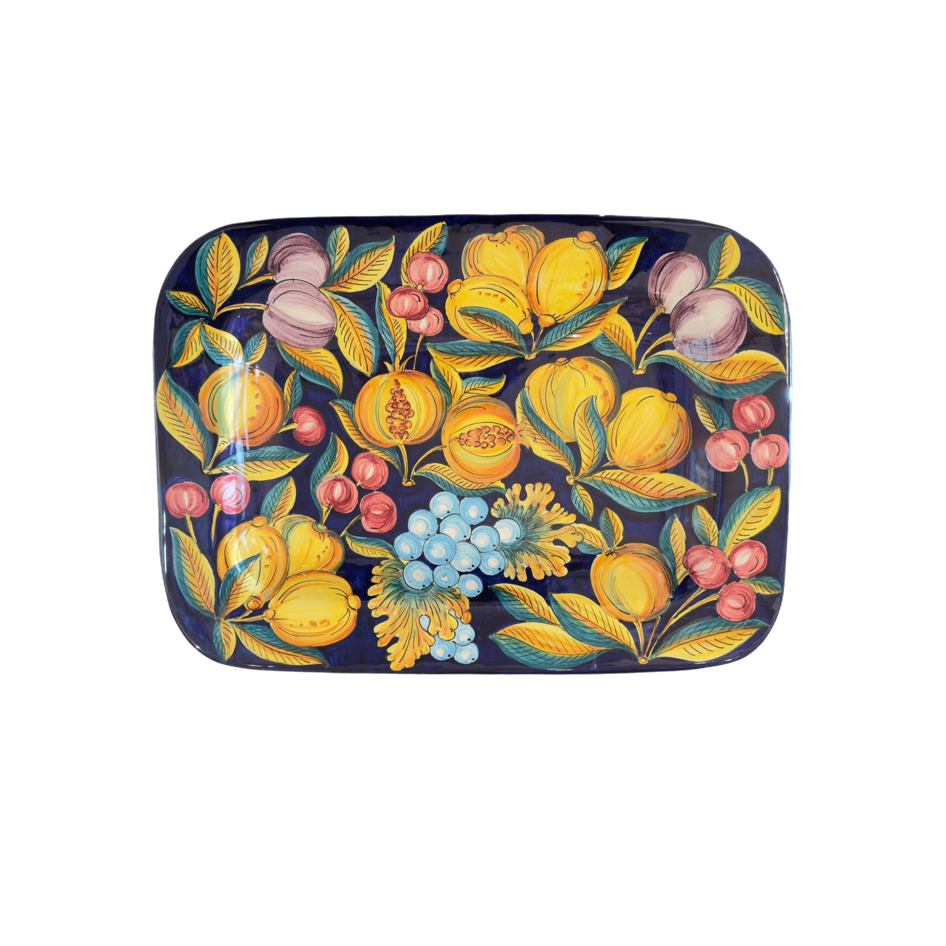 Large Italian hand-painted ceramic wall plate by Francesca Niccacci featuring citrus fruit, berries, and grape motifs on deep blue background