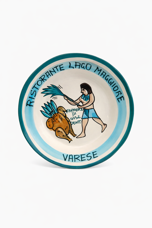Hand-painted Buon Ricordo Italian ceramic plate from Varese with figure preparing poultry and Lago Maggiore restaurant inscription