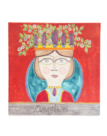 Susanna De Simone ceramic wall art titled Angelica, depicting a queen with floral crown in vibrant red and turquoise, hand-painted in Sicily.