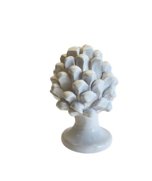 White handcrafted Sicilian ceramic pigna by Susanna De Simone, symbolizing prosperity and good fortune, made in Palermo, Italy.