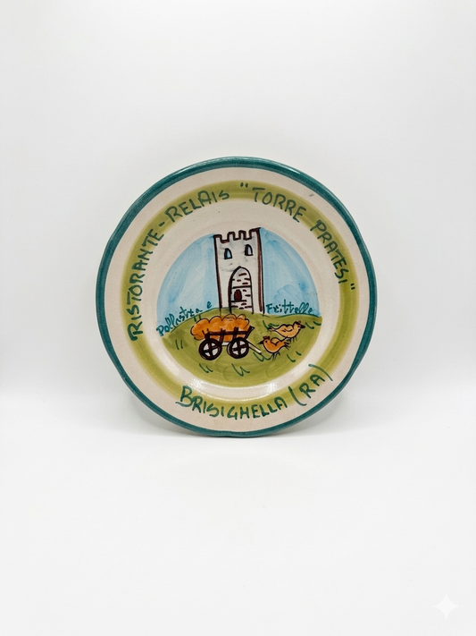 Hand-painted Buon Ricordo Italian ceramic plate with Brisighella tower scene and green border lettering
