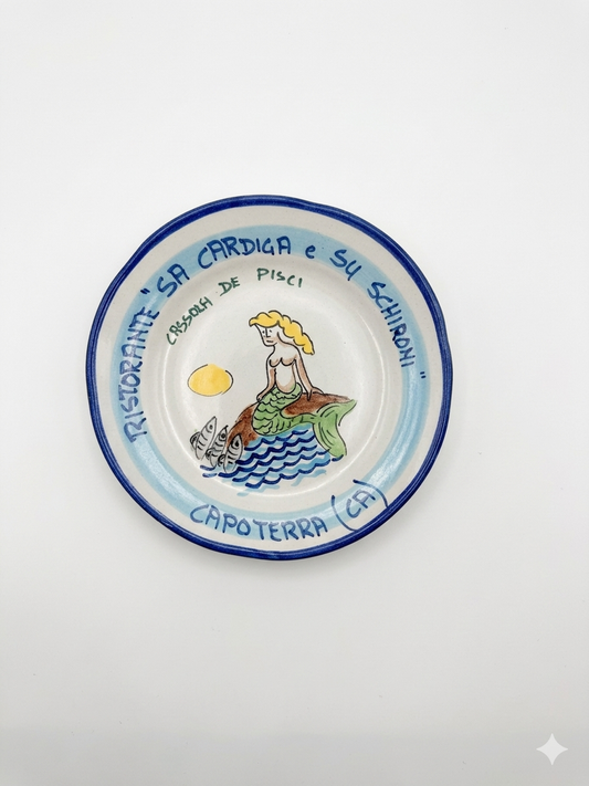Hand-painted Buon Ricordo ceramic plate with mermaid and fish, Ristorante Sa Cardiga e Su Schironi Capoterra inscription, blue coastal border