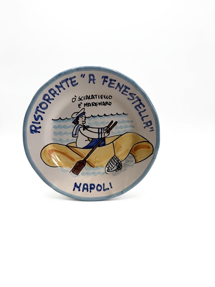 Hand-painted Buon Ricordo ceramic plate with fisherman and pasta motif, Ristorante A Fenestella Napoli inscription, blue coastal design