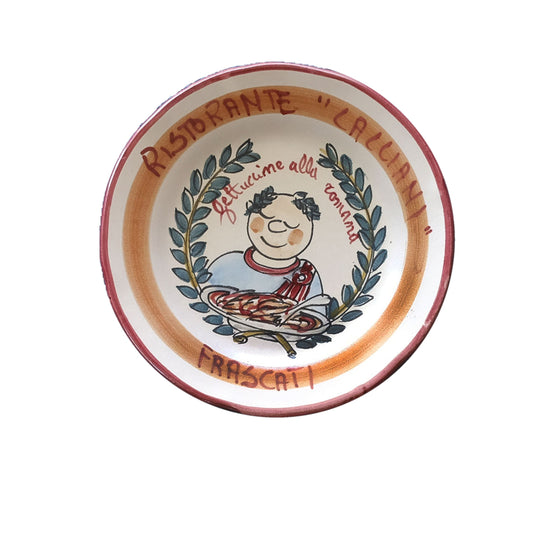 Hand-painted Buon Ricordo Italian ceramic plate from Frascati with a laurel-crowned Roman holding fettuccine, Ristorante Cacciani
