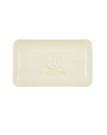 The unwrapped La Marina Vietri scrub bar, a cream-colored triple-milled rectangle embossed with the Blu Costiera monogram and name